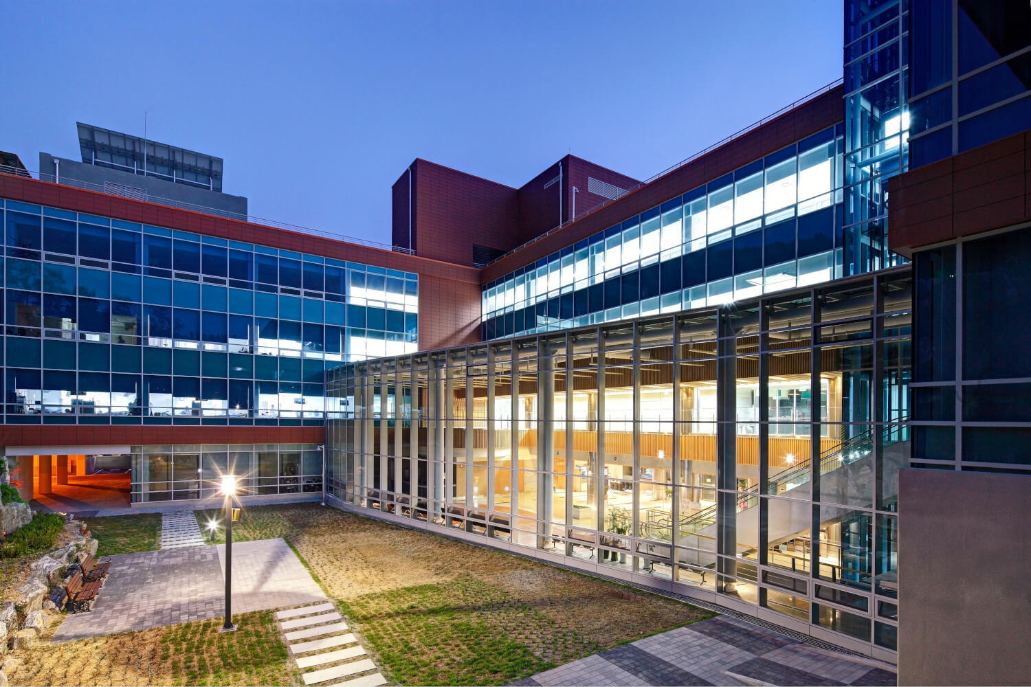 Nighttime view of ceramic facade at Chun'an hospital backyard