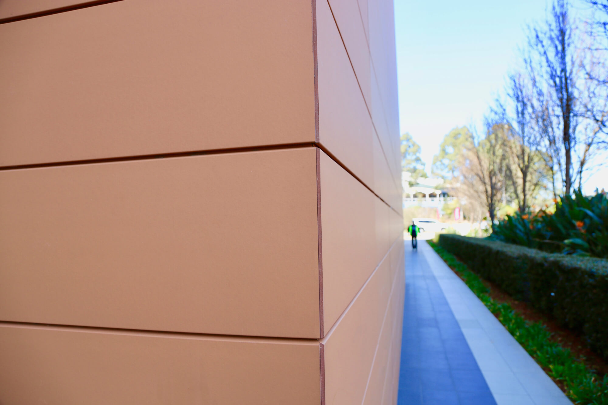 Close-up view of the edge detail of the Tonality terracotta facade at the Bella Vista building, showcasing the versatile and modern design of the material