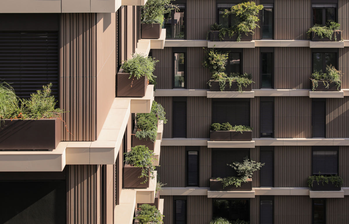 Terracotta ceramic facade as a reference to Montano residential building - backyard view - Sustainable and elegant building design using high-quality ceramic materials