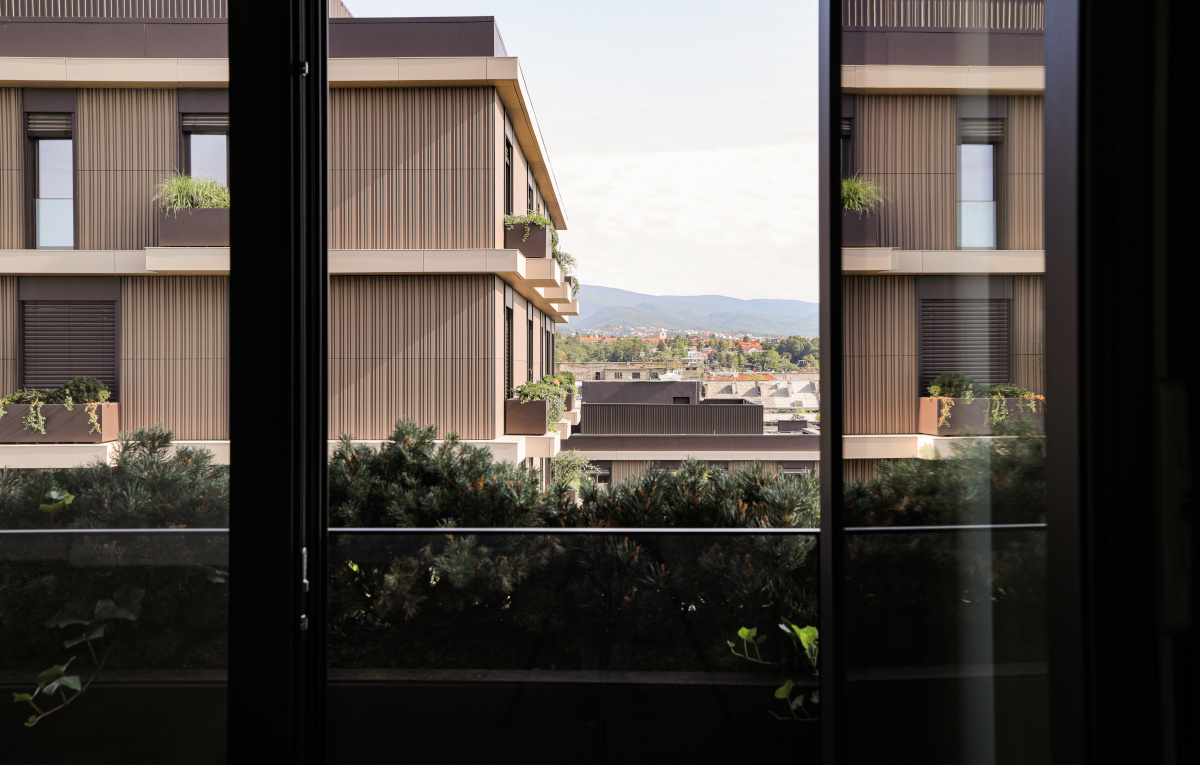Terracotta ceramic facade as a reference to Montano residential building - view from inside - Sustainable and elegant building design using high-quality ceramic materials