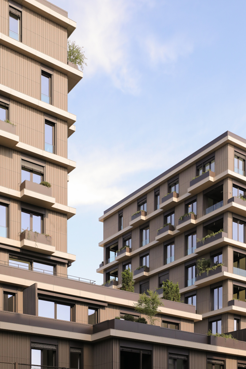 Vertical terracotta ceramic facade at Montano residential building towers - Striking and sustainable building design using high-quality ceramic materials
